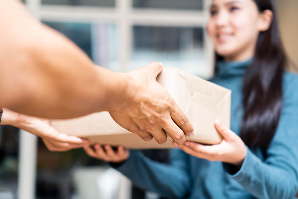 asian-cute-girl-receiving-two-boxes-from-postman-a-2025-03-24-10-06-45-utc (1)