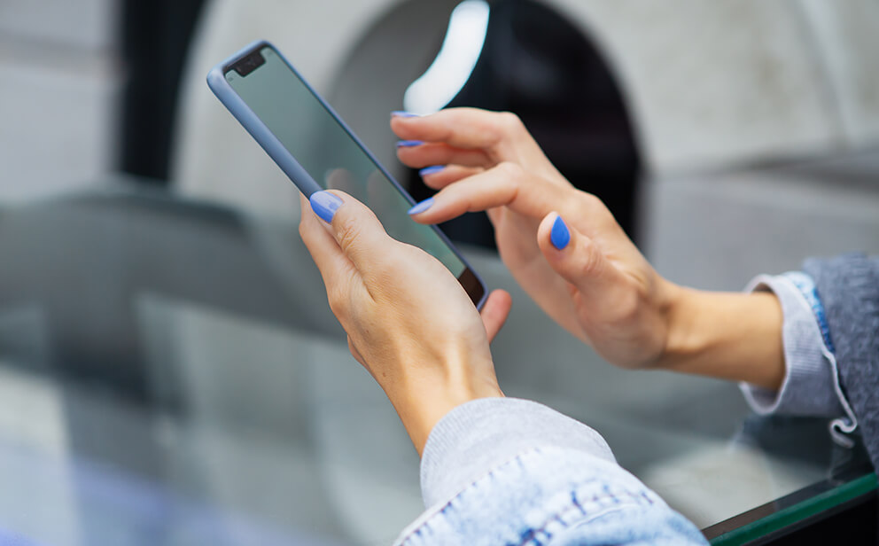 the-girl-sits-in-a-cafe-and-holds-a-touch-phone-a-2025-02-10-09-55-13-utc (1)